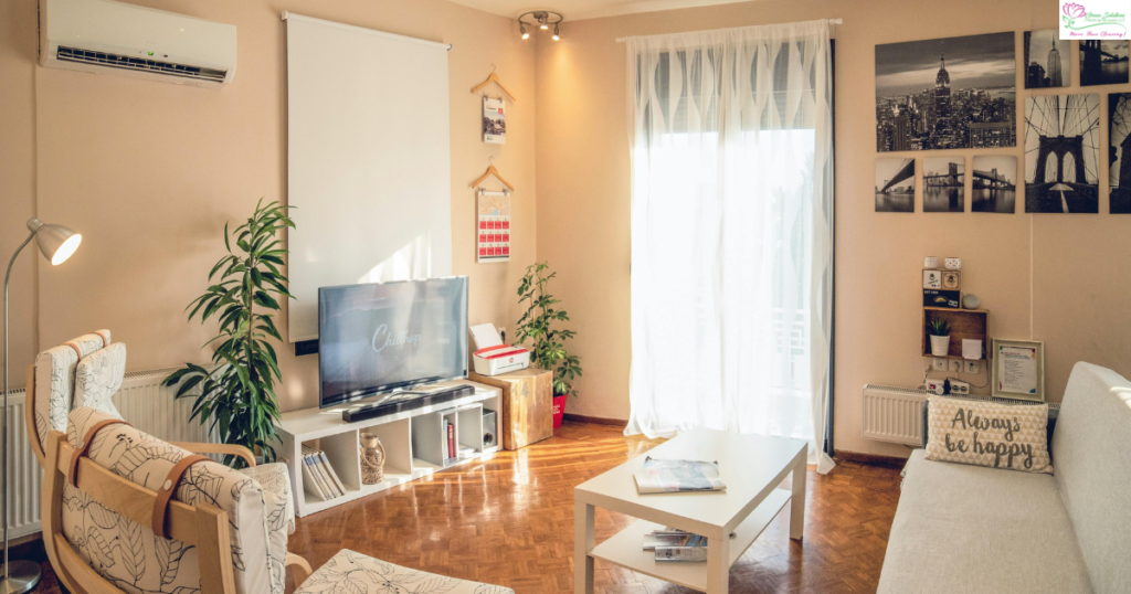 A living room with a television and a table