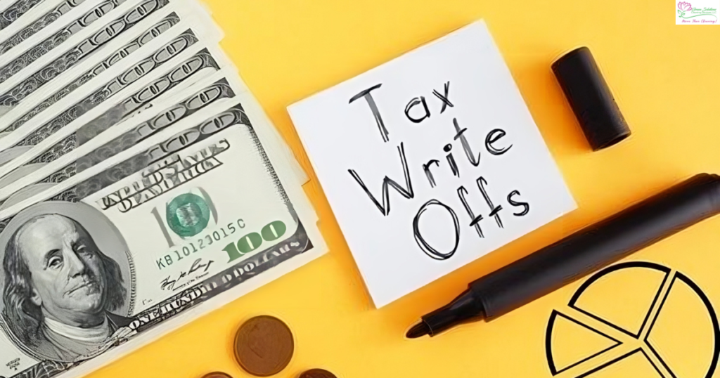 A note that says tax write offs next to money and a marker.